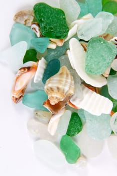 Sea finds. Sea glass and shells on white