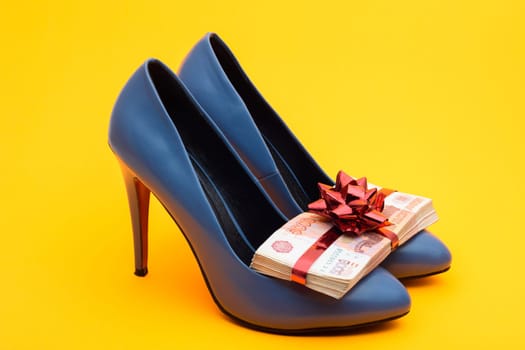 Birthday girl gift blue high-heeled shoes and a pack of five-thousandth bills