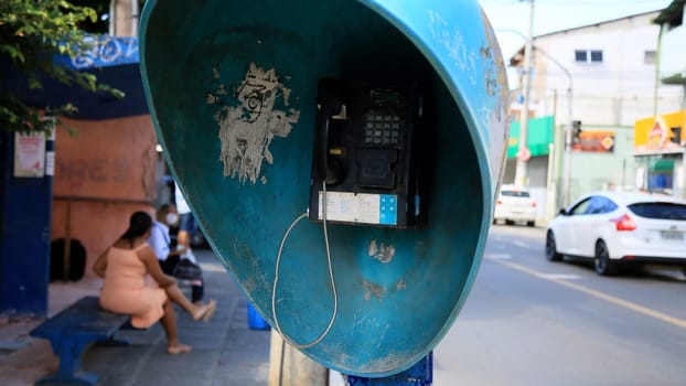 salvador, bahia / brazil - julu 1, 2020: public telephone is seen on the street in the neighborhood of Pernambues, in the city of Salvador....