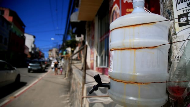 salvador, bahia / brazil - july 1, 2020: improvised system of hand washing seen on the street in the neighborhood of Pernambues, in the city of Salvador.