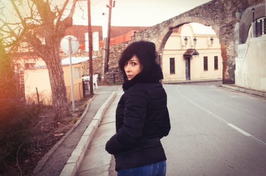 Brunette woman traveling in town