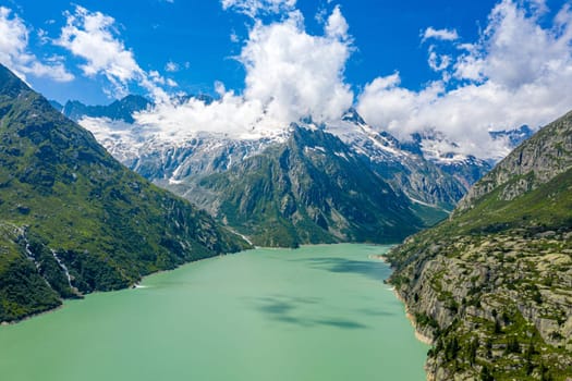 Mountain Lake in the Swiss Alps - Switzerland from above - aerial photography