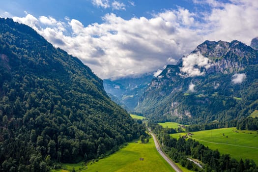 Wonderful aerial view over a valley in the Swiss Alps - Switzerland from above - aerial photography