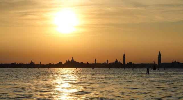 Wonderful sunset over the city of Venice - Skyline in the backlight