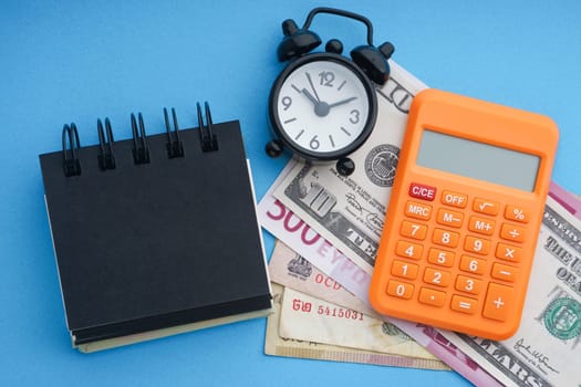 Flat lay of business with office stationary concept on blue background. Business and Copy Space concept