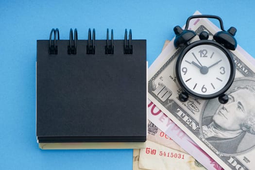 Flat lay of business with office stationary concept on blue background. Business and Copy Space concept