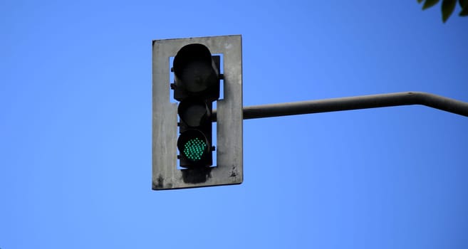 salvador, bahia / brazil - july 1, 2020: a traffic light is seen in the neighborhood of pernambues in the city of Salvador.