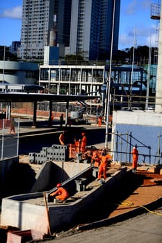salvador, bahia / brazil - september 15, 2015: workers are seen working on the construction of the bus station next to the metro station in Ratula do Abacaxi in the city of Salvador...