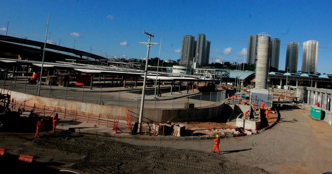 salvador, bahia / brazil - september 15, 2015: workers are seen working on the construction of the bus station next to the metro station in Ratula do Abacaxi in the city of Salvador...