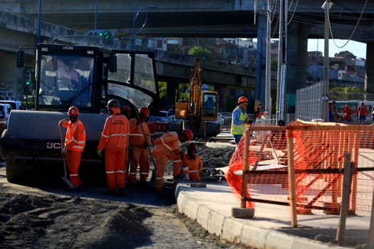 salvador, bahia / brazil - september 15, 2015: workers are seen working on the construction of the bus station next to the metro station in Ratula do Abacaxi in the city of Salvador...