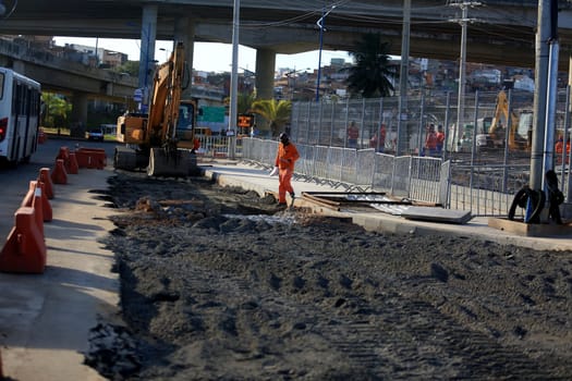 salvador, bahia / brazil - september 15, 2015: workers are seen working on the construction of the bus station next to the metro station in Ratula do Abacaxi in the city of Salvador...