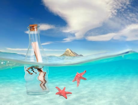 turquoise ocean with underwater view and a message in a bottle, Tropical sea with island and fish, holday and vacation concept