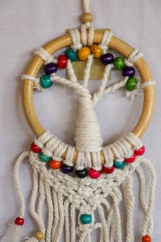 White dreamcatcher - Indian amulet that protects the sleeper from evil spirits and diseases.. The tree - symbol of life. White background.