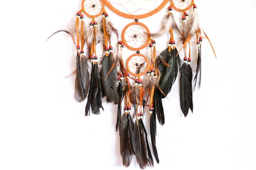 Macro view of real native dream catcher details on pure white background.
