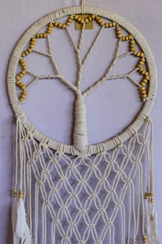 White dreamcatcher - Indian amulet that protects the sleeper from evil spirits and diseases.. The tree - symbol of life. White background.