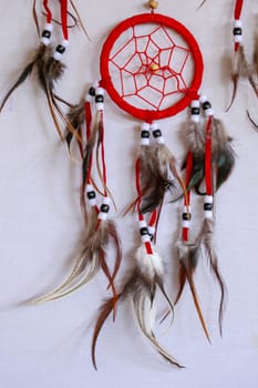 Macro view of real native dream catcher details on pure white background.