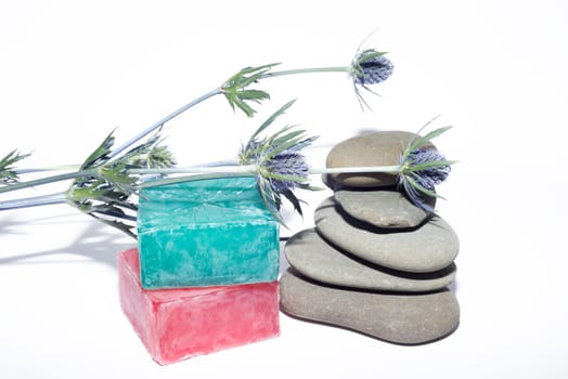 soaps off various shades with grey sone pebbles and lavender