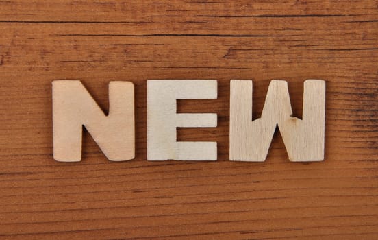 Term from wooden letters on old wooden board