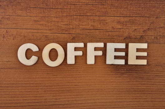 Term from wooden letters on old wooden board