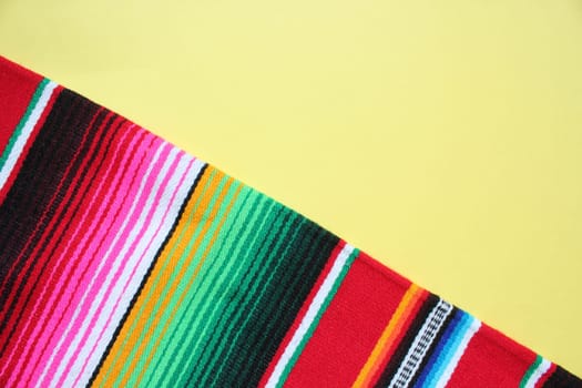 poncho Mexican cinco de mayo rug serape fiesta traditional Mexico background with stripes copy space maya blanket minimal simple -  stock, photo, photograph, image, picture