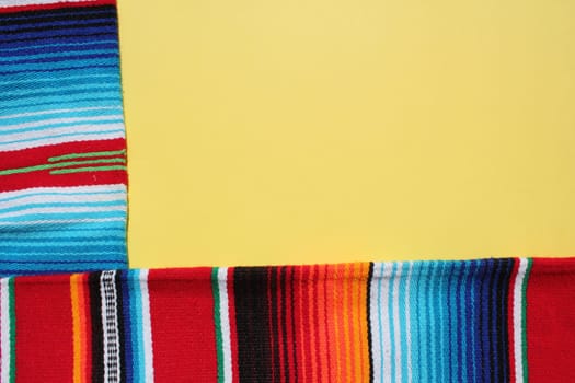 poncho Mexican cinco de mayo rug serape fiesta traditional Mexico background with stripes copy space maya blanket minimal simple -  stock, photo, photograph, image, picture