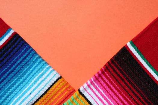 poncho Mexican cinco de mayo rug serape fiesta traditional Mexico background with stripes copy space maya blanket minimal simple -  stock, photo, photograph, image, picture