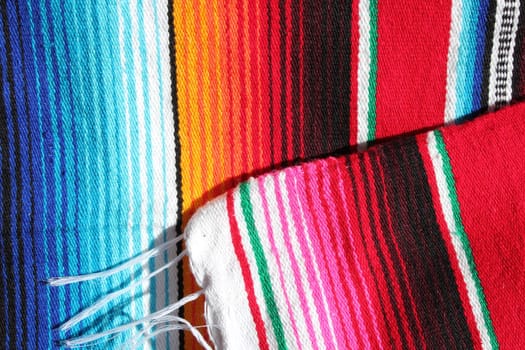 poncho Mexican cinco de mayo rug serape fiesta traditional Mexico background with stripes copy space maya blanket minimal simple -  stock, photo, photograph, image, picture