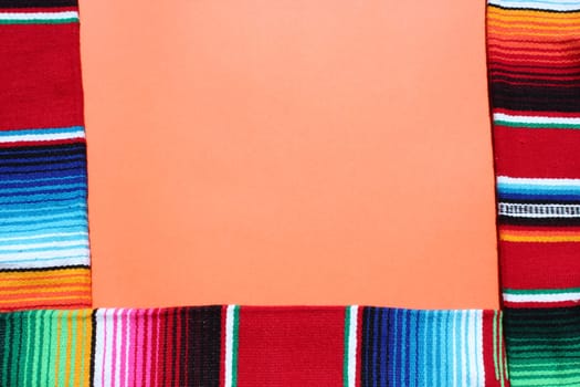 poncho Mexican cinco de mayo rug serape fiesta traditional Mexico background with stripes copy space maya blanket minimal simple -  stock, photo, photograph, image, picture