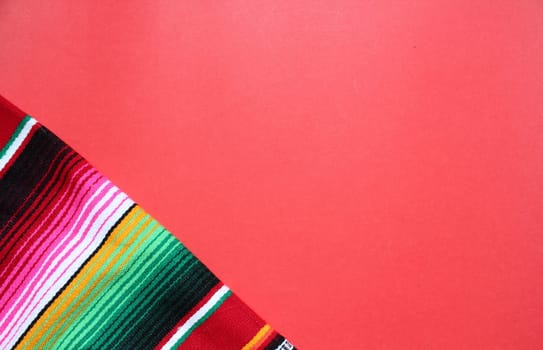 poncho Mexican cinco de mayo rug serape fiesta traditional Mexico background with stripes copy space maya blanket minimal simple -  stock, photo, photograph, image, picture