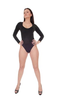 A young beautiful woman standing in a black body suit and long legs,.with long hair, showing her nice figure, isolated for white background.