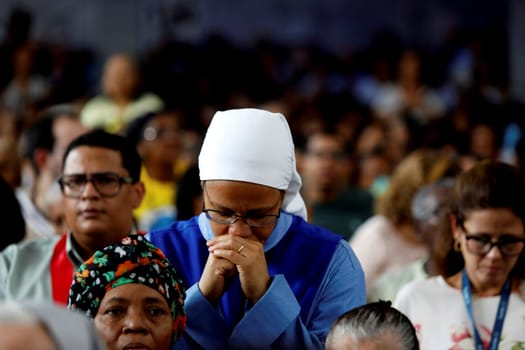 salvador, bahia / brazil - march 19, 2019: people pray during mass in the sanctuary of Irma Dulce in the city of Salvador.