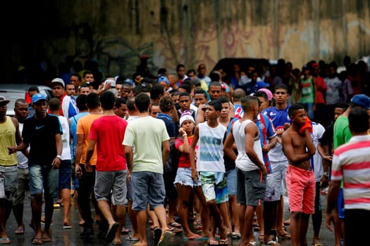 salvador, bahia / brazil - april 20, 2015: Esporte Clube Bahia fans face the queue to buy tickets at the Fonte Nova Arena in the city of Salvador, for the Bahia Football Championship match.