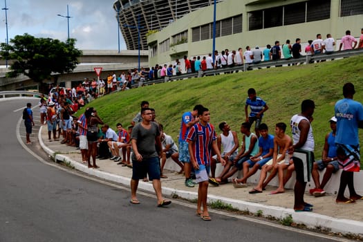 salvador, bahia / brazil - april 20, 2015: Esporte Clube Bahia fans face the queue to buy tickets at the Fonte Nova Arena in the city of Salvador, for the Bahia Football Championship match.
