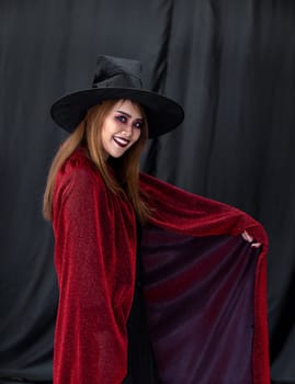 Portrait of asian young adult teenage woman wear Halloween costume cloth for Halloween party carnival. Halloween celebrate and international holiday concept.