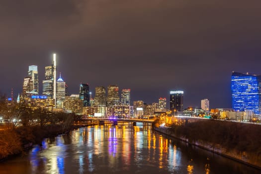 Night Cityscape of Philadelphia skyscraper Skylines building sunset along river in Philly city downtown of Philadelphia in PA USA. Cityscape Urban lifstyle concept.