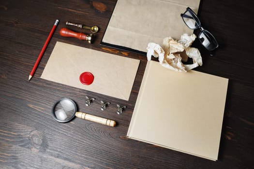 Blank vintage stationery set on wooden background. Template for branding identity. For graphic designers presentations and portfolios.