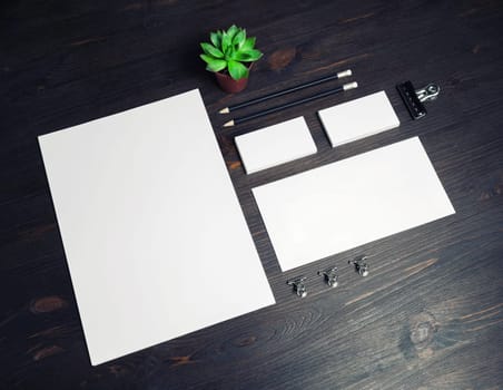 Branding stationery mockup on wood table background. Blank objects for placing your design.