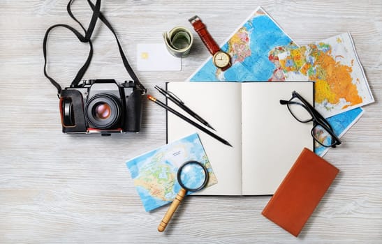 Essential travel accessories. Vintage vacation items. Outfit of traveler. Flat lay.