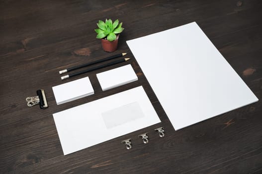 Blank corporate stationery set on wood table background. Template for branding design. Branding mock up.