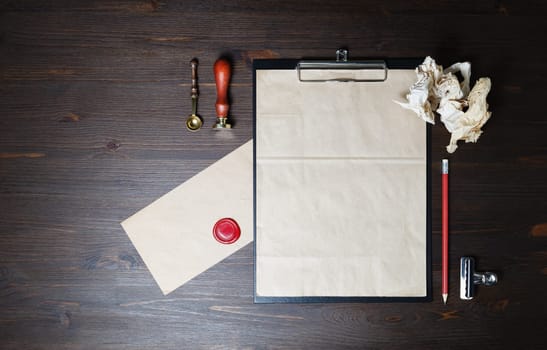Blank vintage stationery for branding design. Corporate identity set on wooden background. Flat lay.