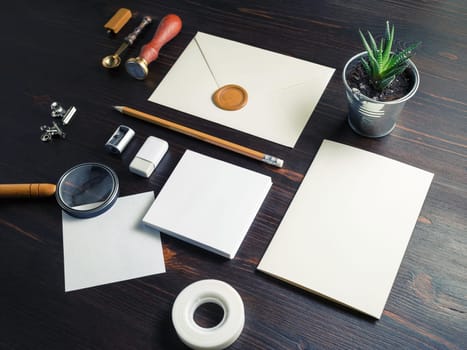 Branding mock up. Photo of blank corporate identity. Stationery set on vintage wooden background.