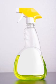 Cleaning liquid bottle in front of  light gray background, editable mock-up series template ready for your design, selection path included.