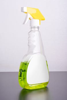 Cleaning liquid bottle in front of  light gray background, editable mock-up series template ready for your design, selection path included.