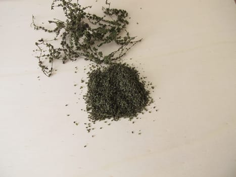 Dried nettle seeds superfood on a wooden board