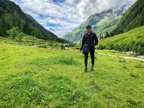 Asian woman makes holiday in the European alps