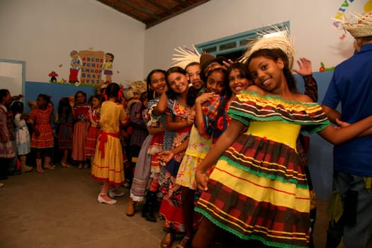 eunapolis, bahia / brazil - june 18, 2013: Eunapolis city public school students celebrate the festivities of Sao Joao, dancing gang...