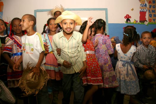 eunapolis, bahia / brazil - june 18, 2013: Eunapolis city public school students celebrate the festivities of Sao Joao, dancing gang...
