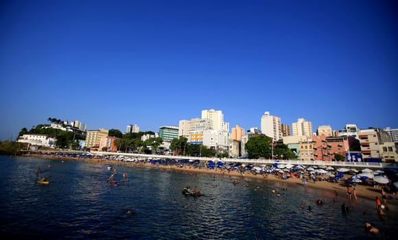 salvador, bahia / brazil - december 5, 2015: people are seen on Porto da Barra beach in the city of Salvador..