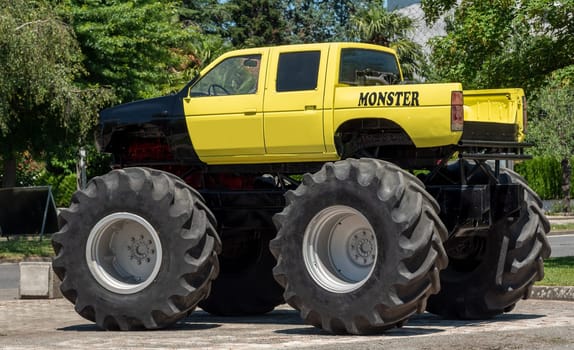 a view of yellow monster truck