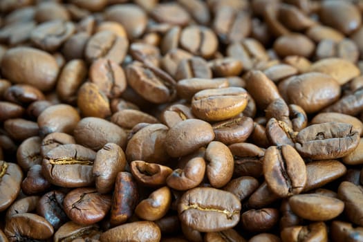 roasted coffee beans on a kitchen table